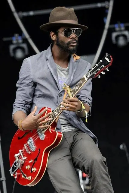 Musician with Red Electric Guitar