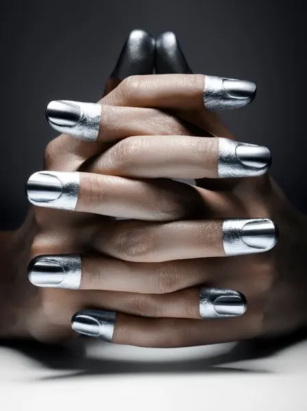 Stacked Hands with Metallic Nails