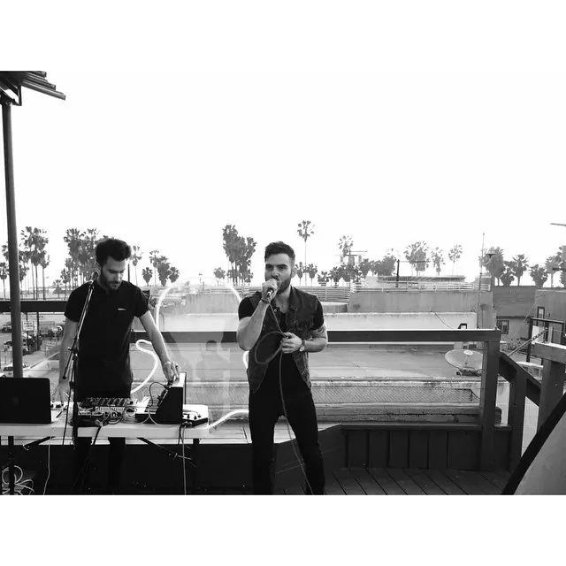 Rooftop music performance, photographic, minimal, monochrome