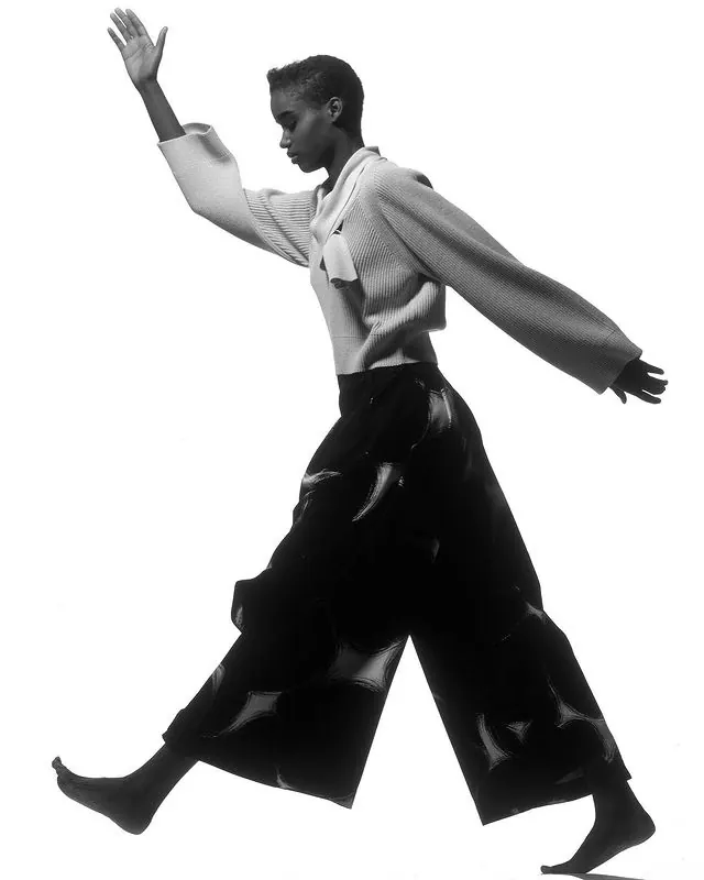 Fashion model in motion, photographic, editorial, monochrome