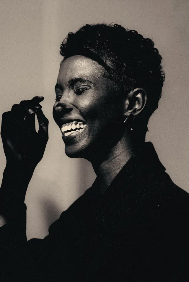 Black and White Portrait of a Smiling Woman