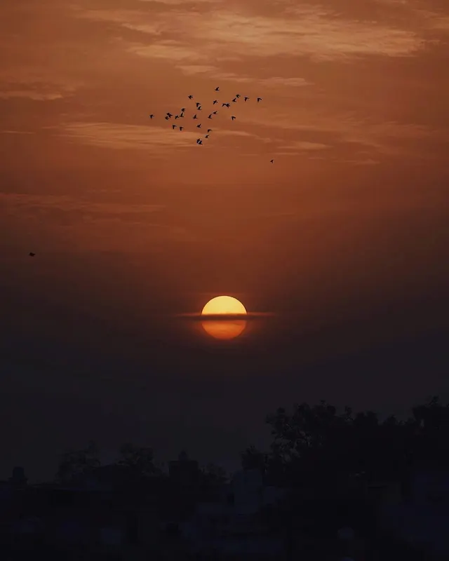 Sunset over Silhouette Landscape