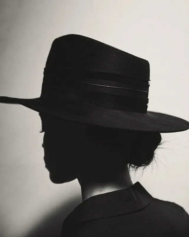 Profile of Person in Wide-Brimmed Hat