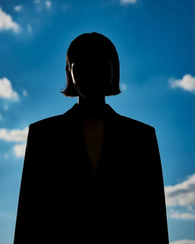 Silhouette Portrait against Blue Sky