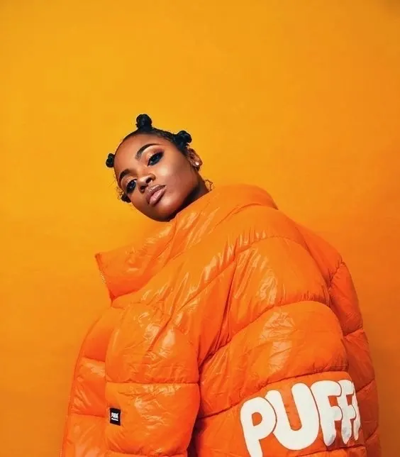 Orange Puffer Jacket Portrait