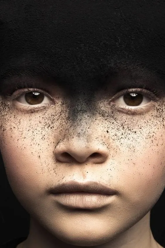 Close-up Portrait of a Child with Speckles