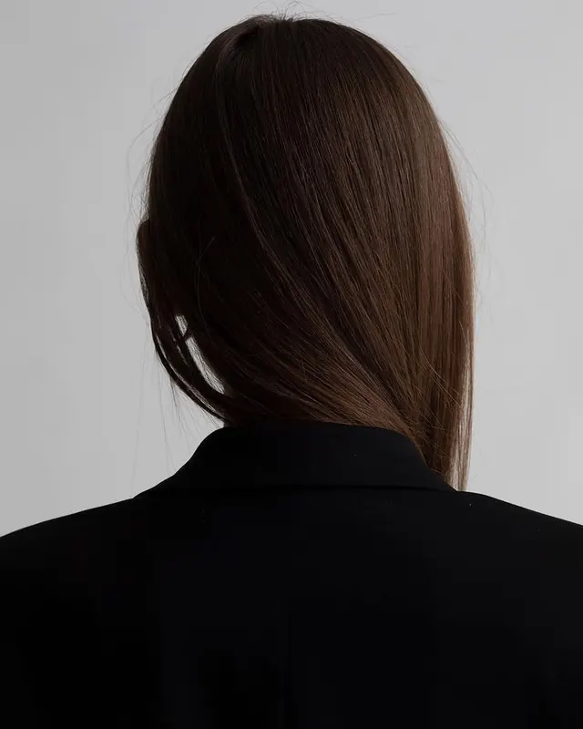 Portrait of a Woman in Black Blazer