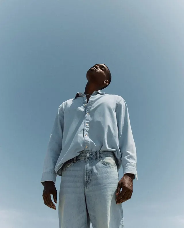 Portrait of a Person in Light Blue Attire
