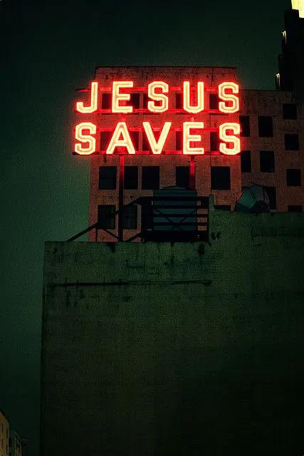 Neon Signage on Brick Building