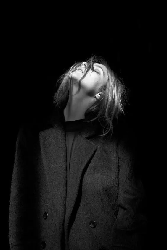 Monochrome Portrait of a Woman in a Coat