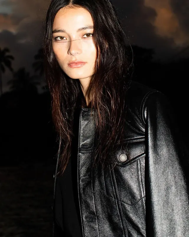 Portrait of woman in leather jacket