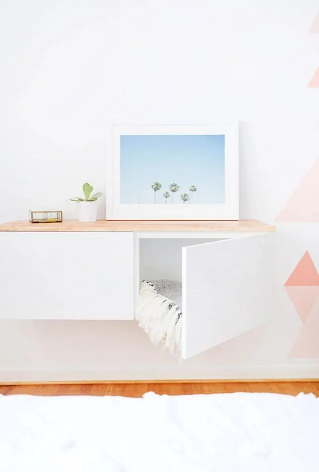Minimal white credenza with open door and geometric wall, minimal, light-mode, light