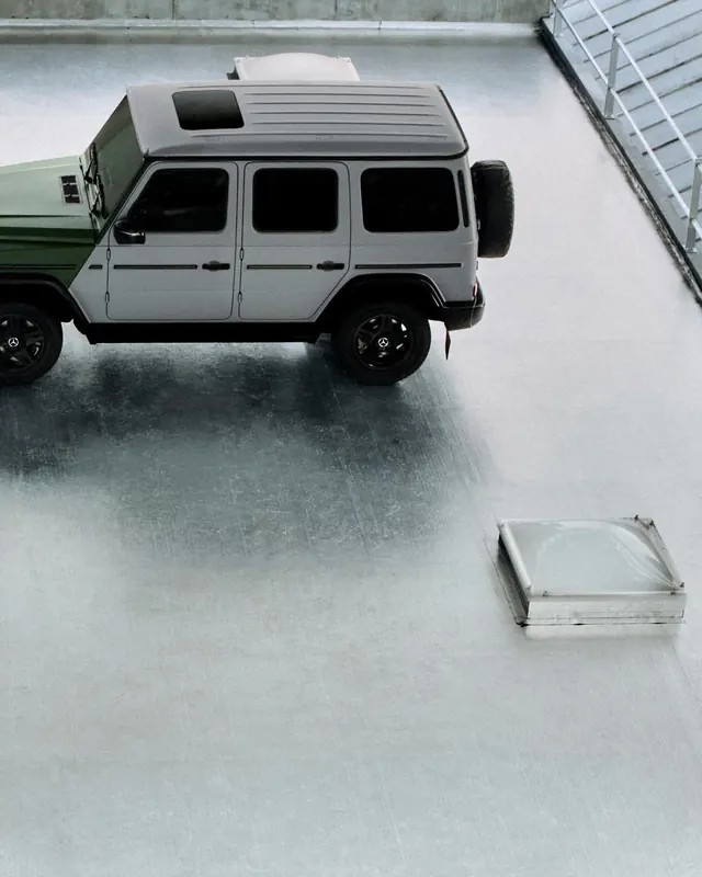 Mercedes-Benz G-Wagon two-tone studio shot, minimal, luxury, muted