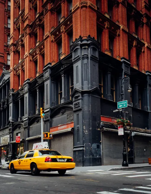 Urban Street Scene with Yellow Taxi