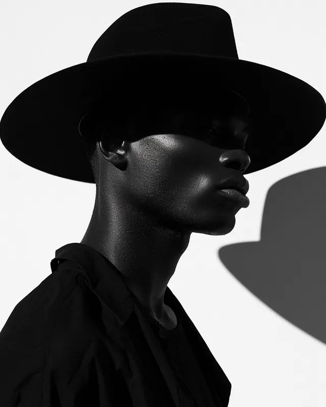 Monochrome Portrait with Wide-Brimmed Hat