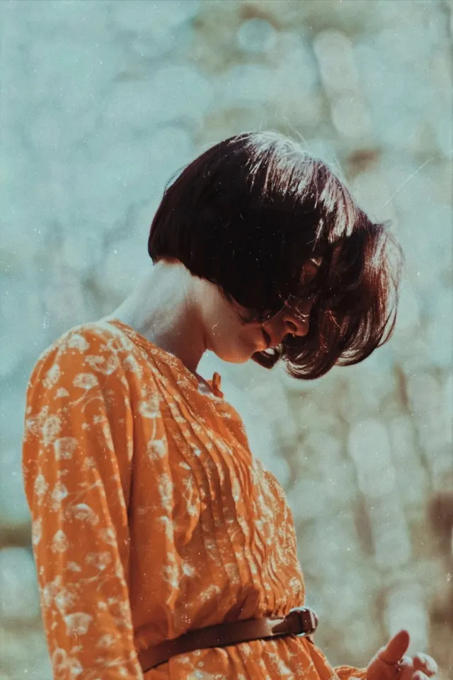 Portrait of a woman in patterned garment