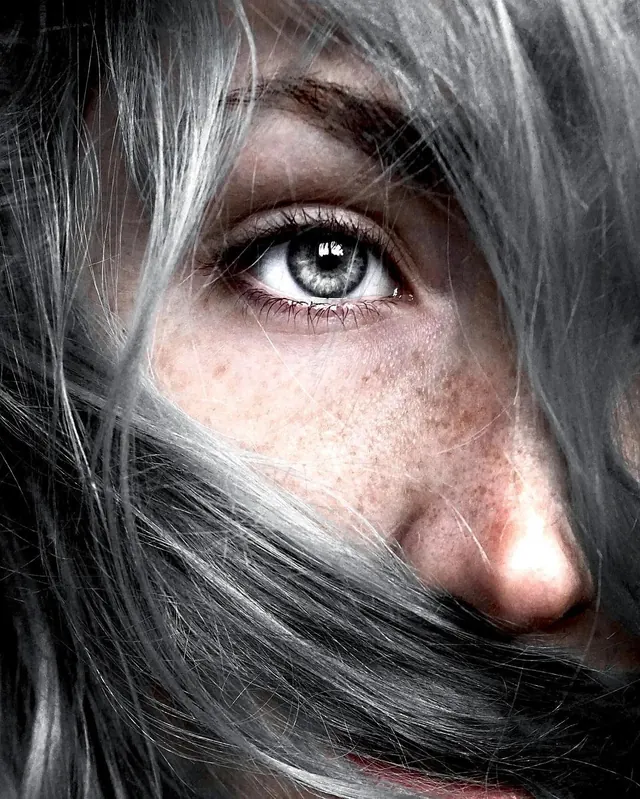 Close-up Portrait of a Person with Grey Hair