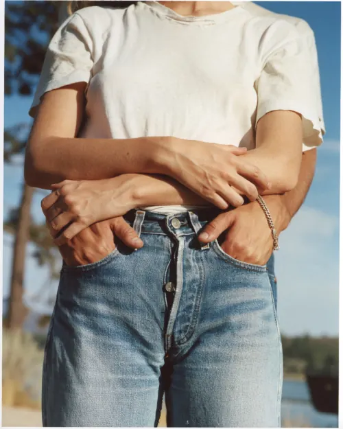 Person in White T-Shirt and Denim