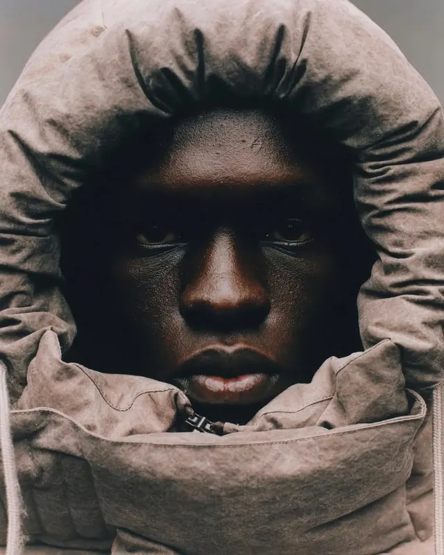 Portrait in Hooded Garment