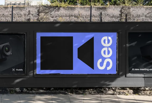 Huddly storefront signage with geometric logo, minimal, geometric, dark