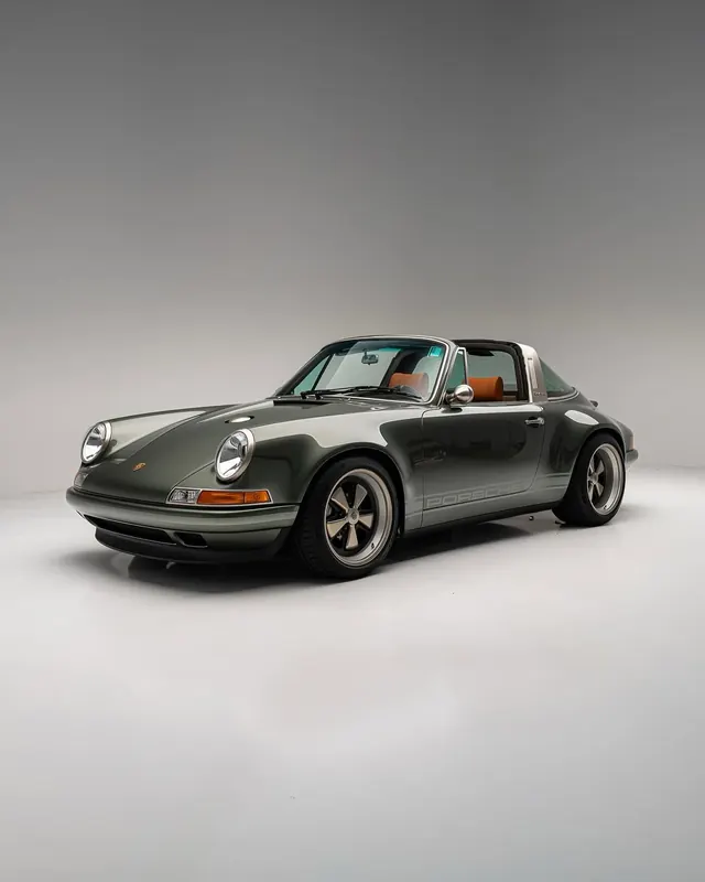 Vintage Porsche sports car on white background, photographic, technical, light