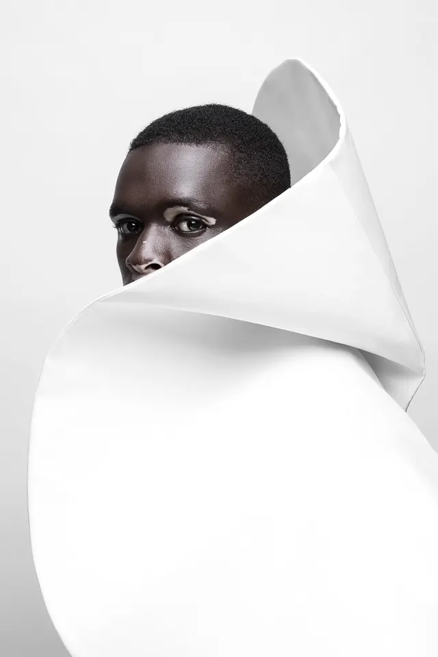 Minimalist portrait with white fabric wrapping, minimal, photographic, light