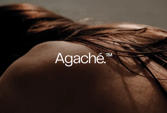 Agachè brand wordmark on fabric, minimal, luxury, warm
