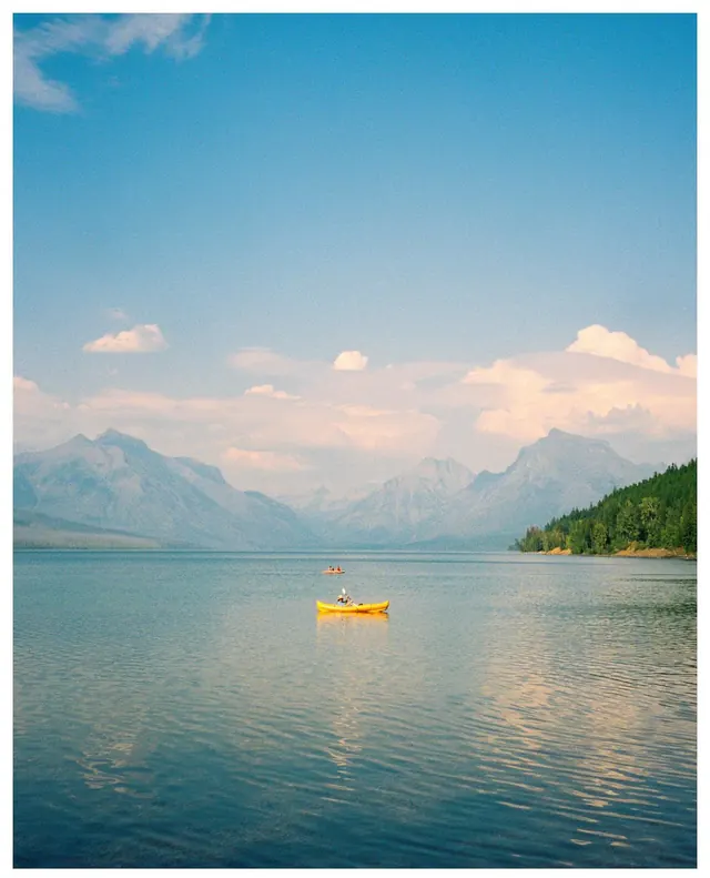 Mountain lake landscape with kayak, photographic, light-mode, cool