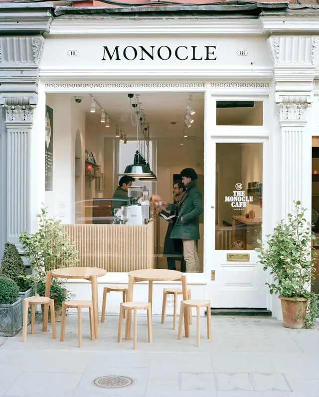 Monocle café storefront, minimal, swiss, light