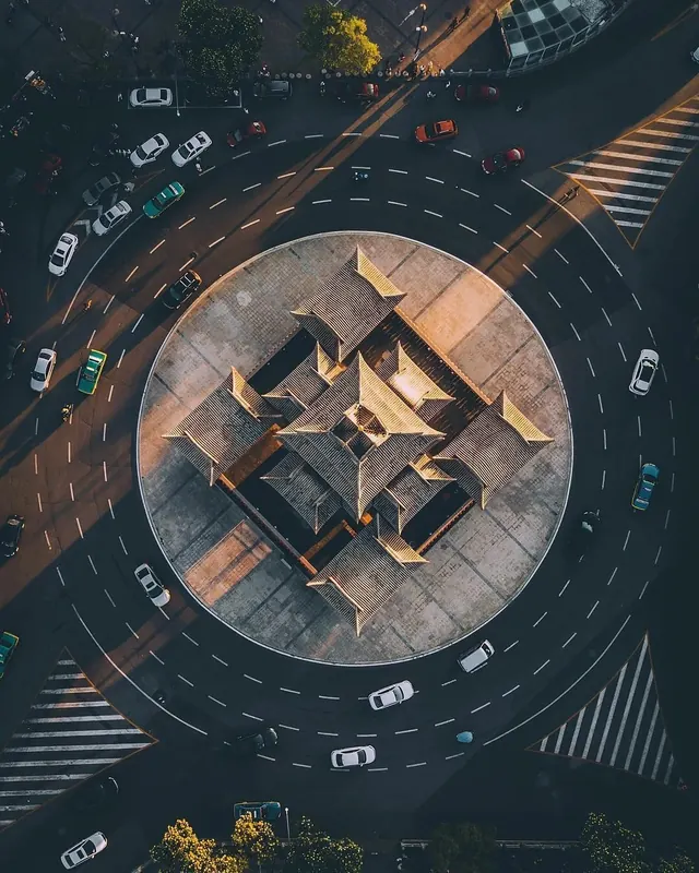 Urban aerial traffic roundabout, photographic, technical, dark