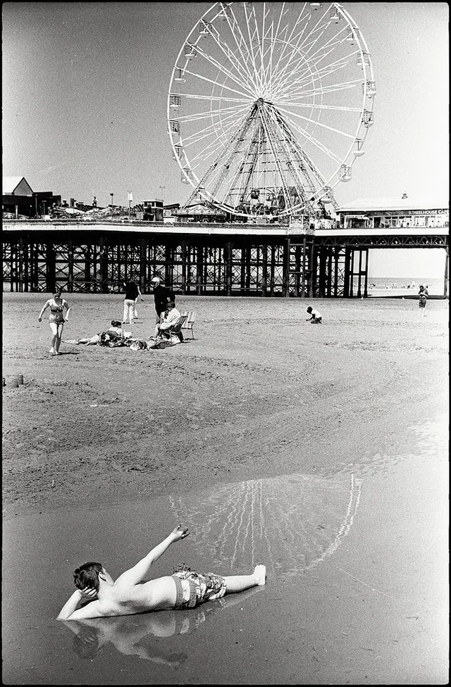 Vintage black and white beach photograph with ferris wheel, photographic, monochrome, monochrome
