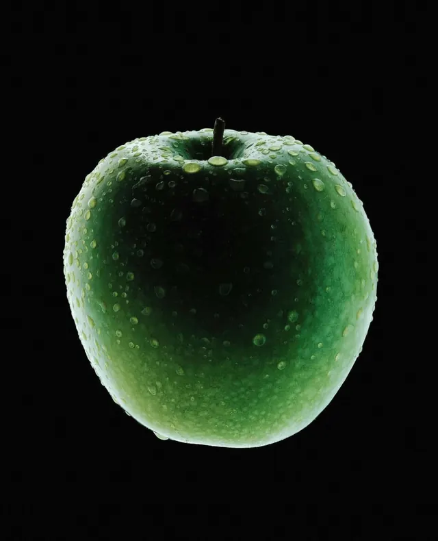 Green apple with water droplets, photographic, minimal, cool