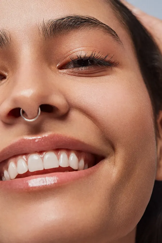 Close-up beauty photography—face detail, photographic, organic, warm