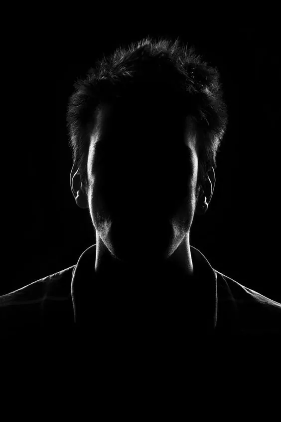 Silhouetted face portrait, dark-mode, photographic, dark