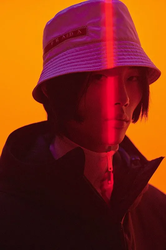 Prada Linea Rossa bucket hat fashion photography, photographic, bold, vibrant