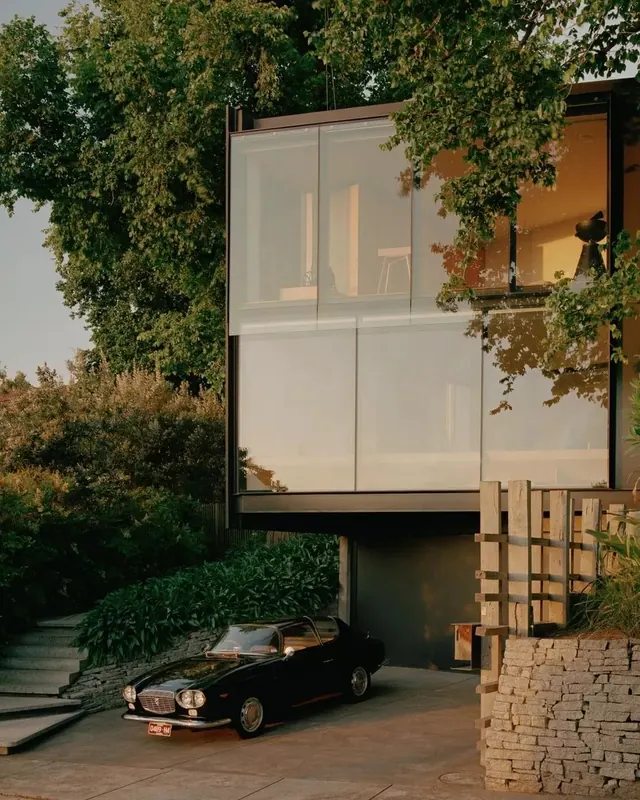 Modernist house with vintage car, photographic, minimal, warm