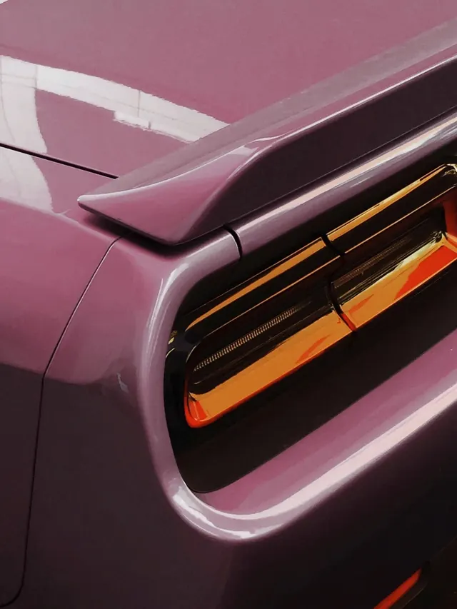 Pink classic car detail, photographic, luxury, warm