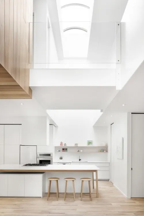 Modern minimalist kitchen with skylights, minimal, corporate-clean, light