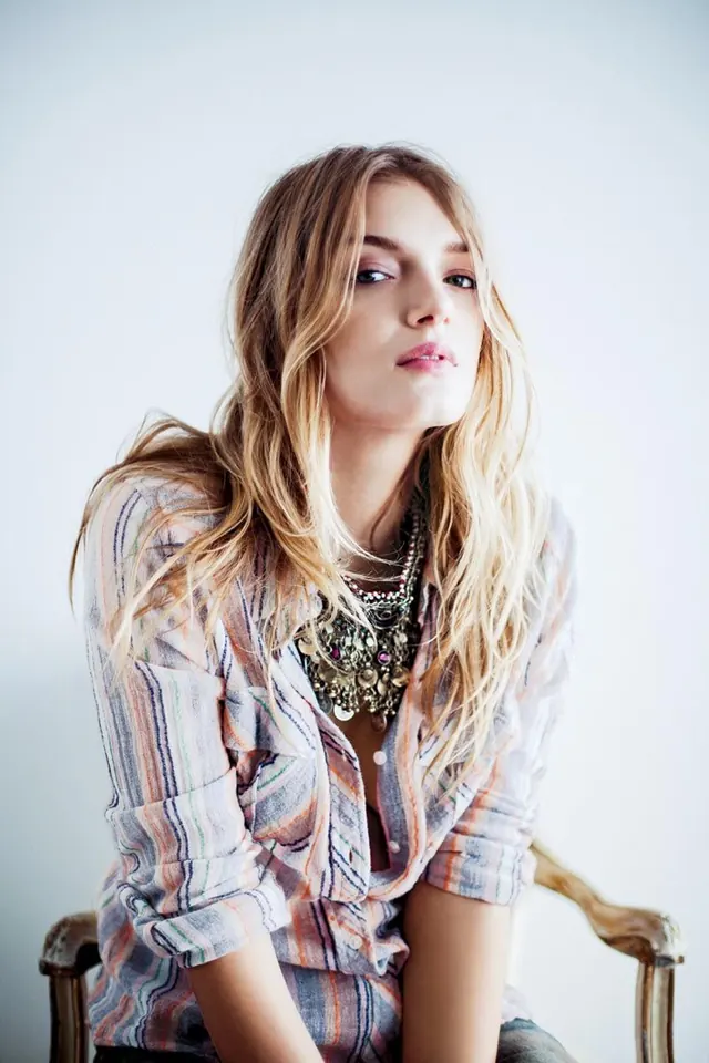 Portrait of a woman in a plaid shirt