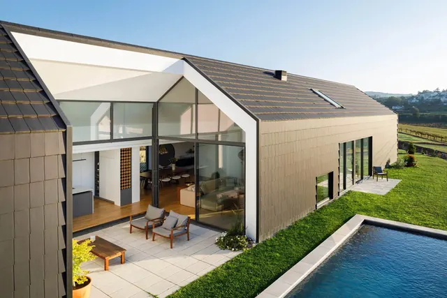 Dark tiled gable house with pool, minimal, photographic, dark