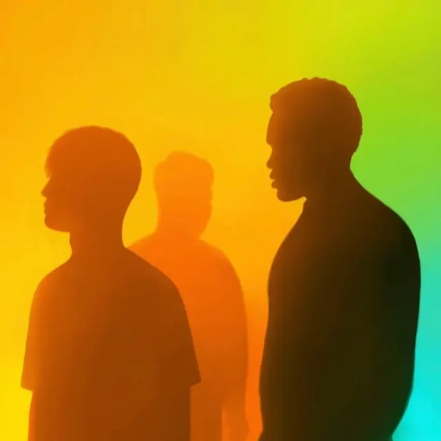 Silhouetted Young Men Against Rainbow Gradient, editorial, minimal, vibrant