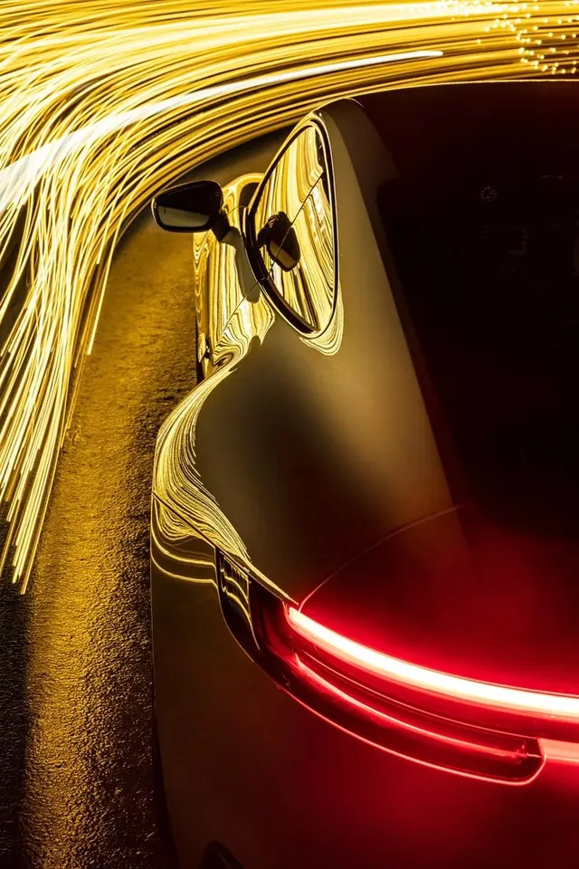 Porsche light-painting rear detail, photographic, dark-mode, dark