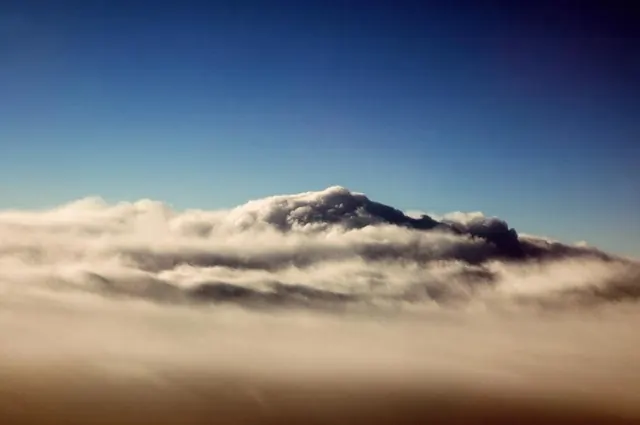 Mountain Peak Above Clouds