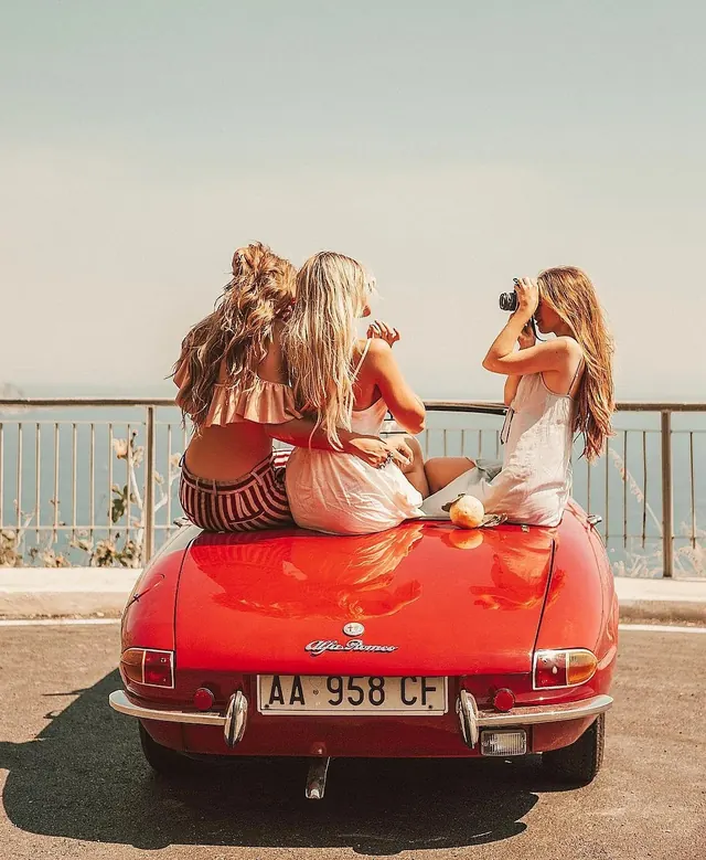 Vintage Red Convertible with Models