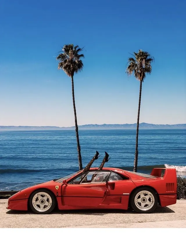Ferrari F40 coastal legs shot, photographic, luxury, vibrant