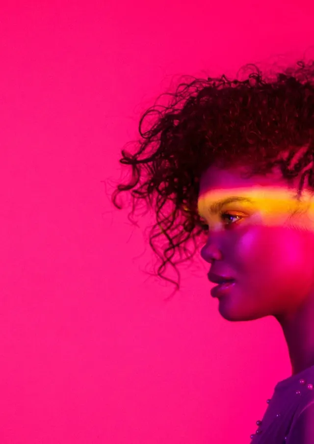 Gel-lit profile portrait, photographic, minimal, vibrant