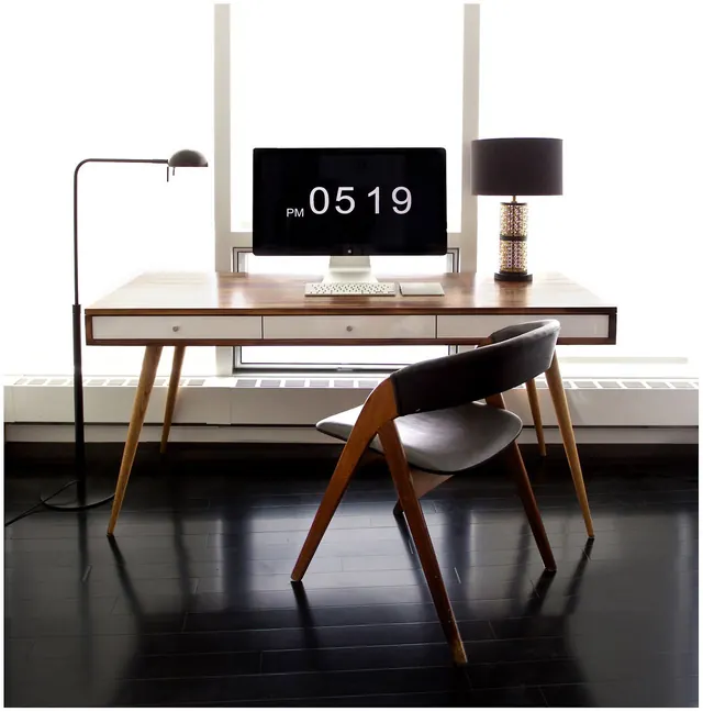 Mid-century home office by window, minimal, photographic, warm