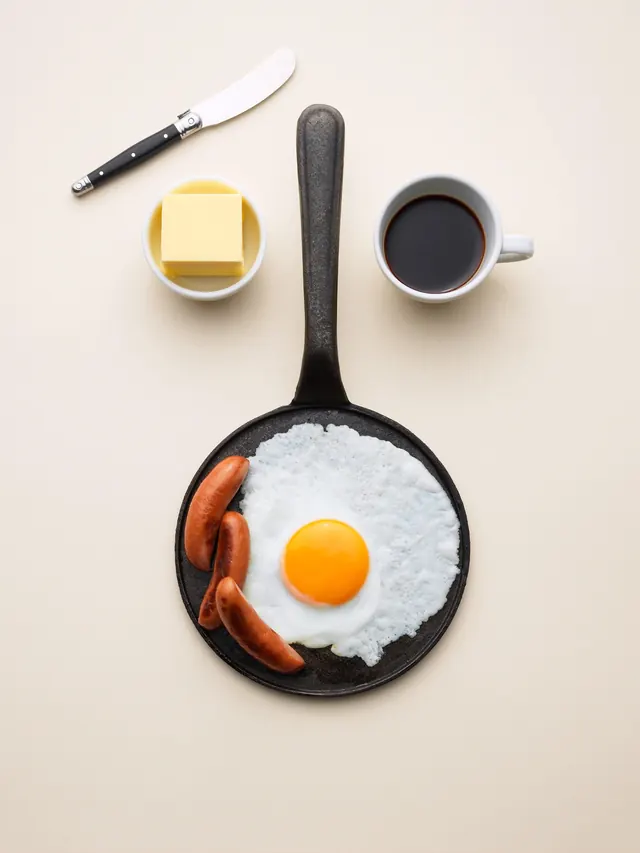 Breakfast flat lay face composition, minimal, playful, warm