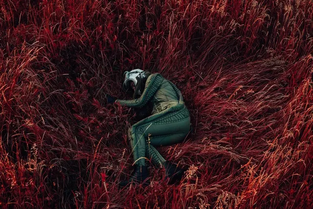 Figure in Red Foliage