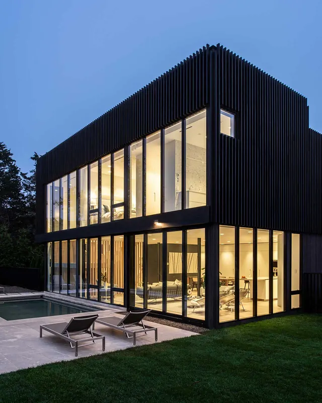 Black-slatted house at twilight, minimal, luxury, dark
